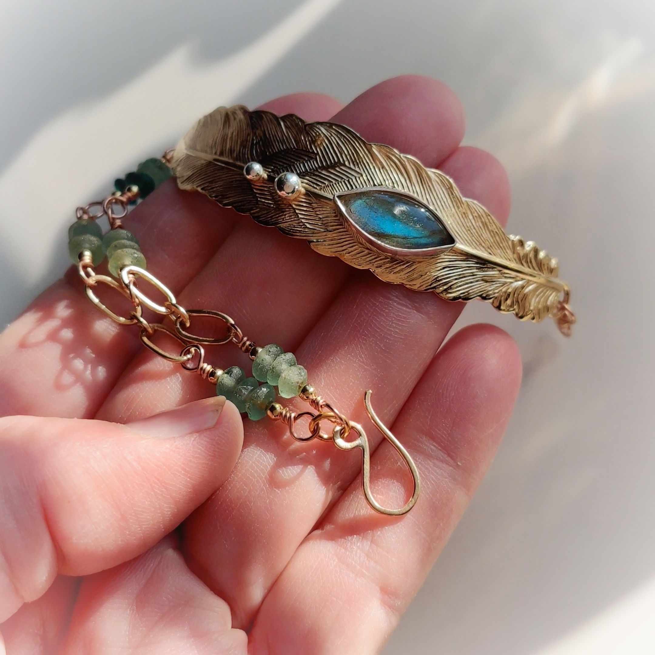 Curved feather ... labradorite