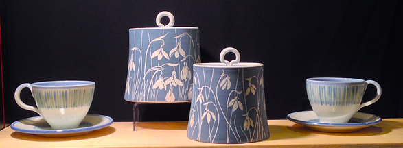 Handmade porcelain pottery jars with snowdrop design