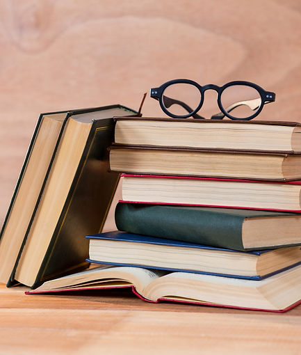 various-books-with-spectacles-table.jpg