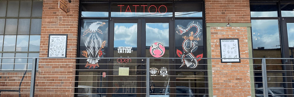Exterior storefront of Houston Tooth Gems inside Battle Royale Tattoo.