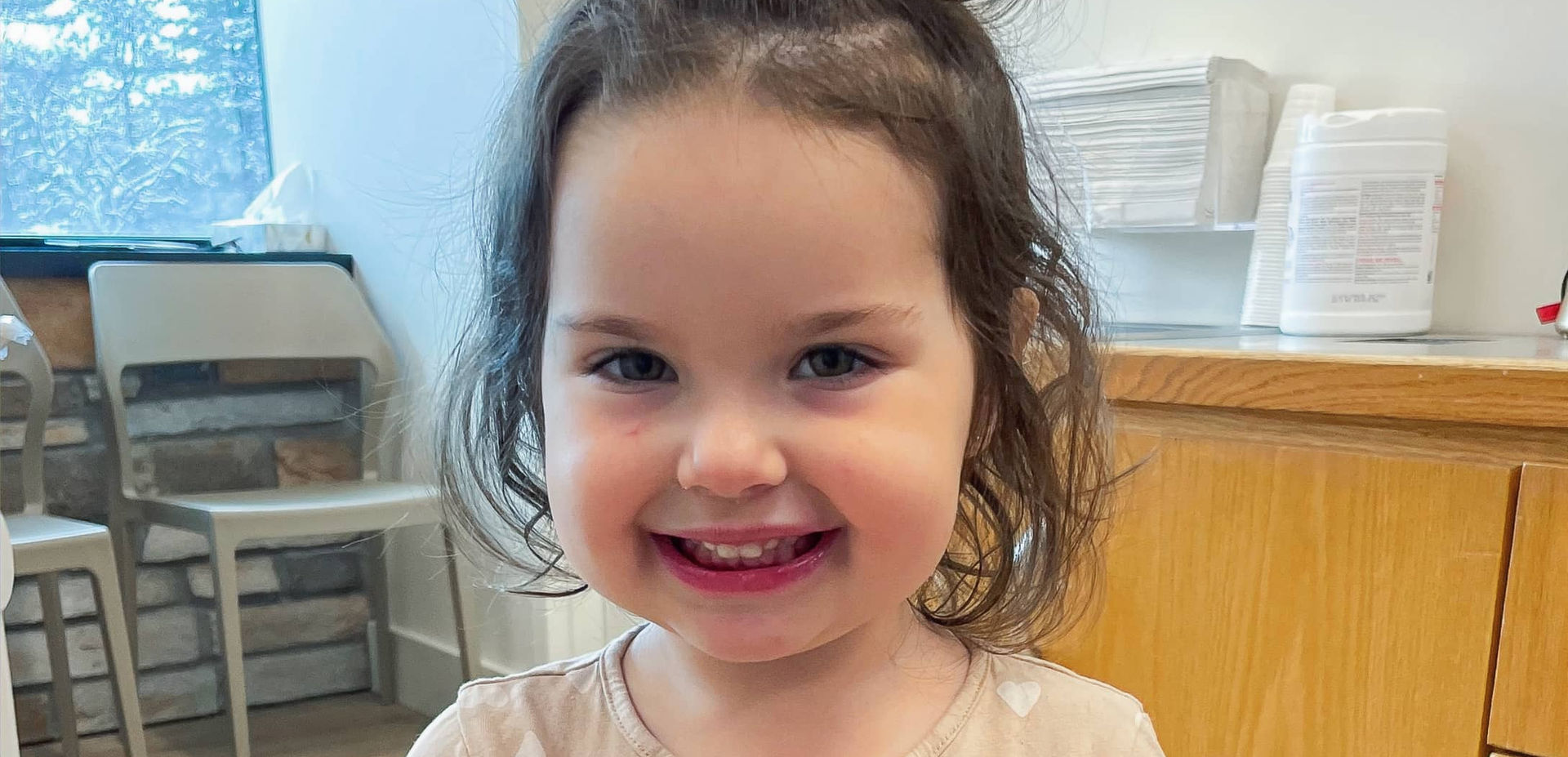 young girl after pediatric dentist visit