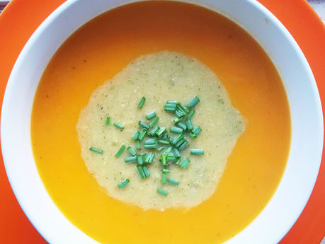 yellow squash puree soup in a bowl