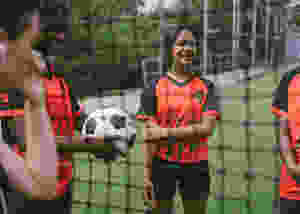Girl soccer soccer net