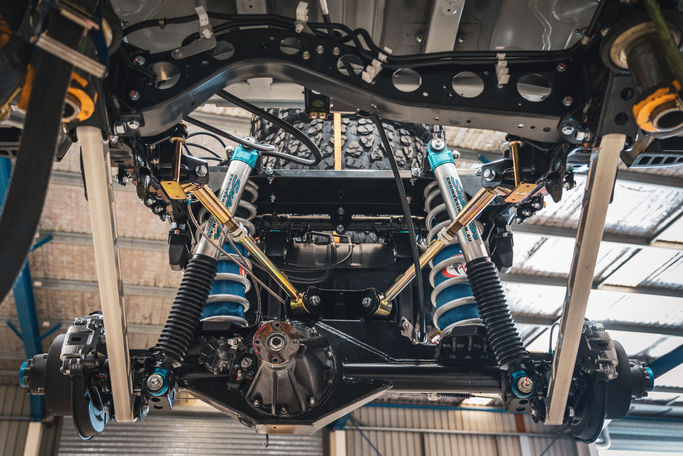 Underneath shot of 79 Series rear axle with Superior coil conversion suspension setup