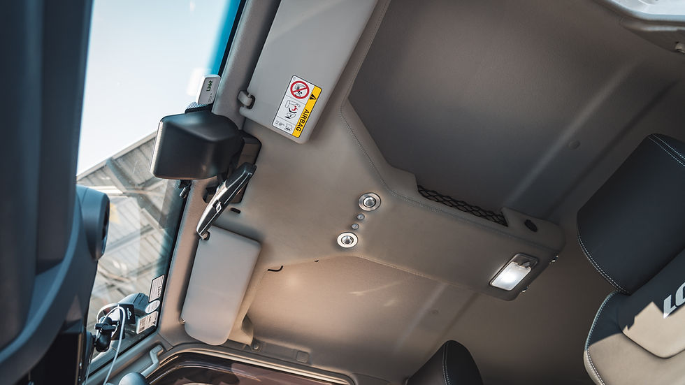 Interior roof view showing the T-shaped Department of Interior roof console inside the 76 Series LandCruiser.