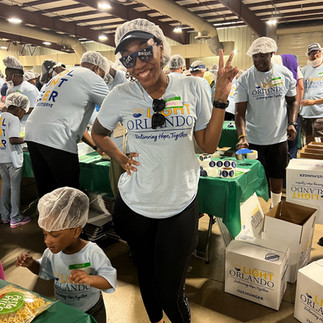 Light Orlando Volunteers working together to build one million meals