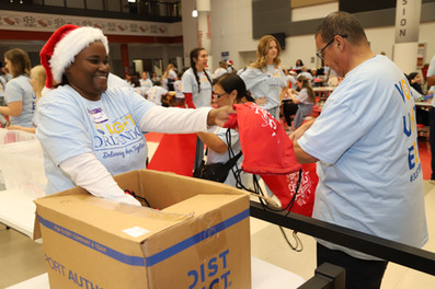 Orlando area volunteers gather for the fifth annual Light Orlando Community Christmas Project 