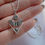 Thumbnail: Sterling Silver or Gold Filled Moth with Sun and Moon Necklace