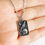 Thumbnail: Sterling Silver Raven and Skull Necklace