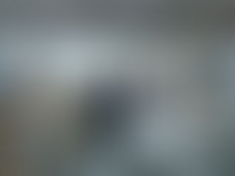 Business professionals inspecting products and discussing quality standards inside a Chinese factory during supplier verification