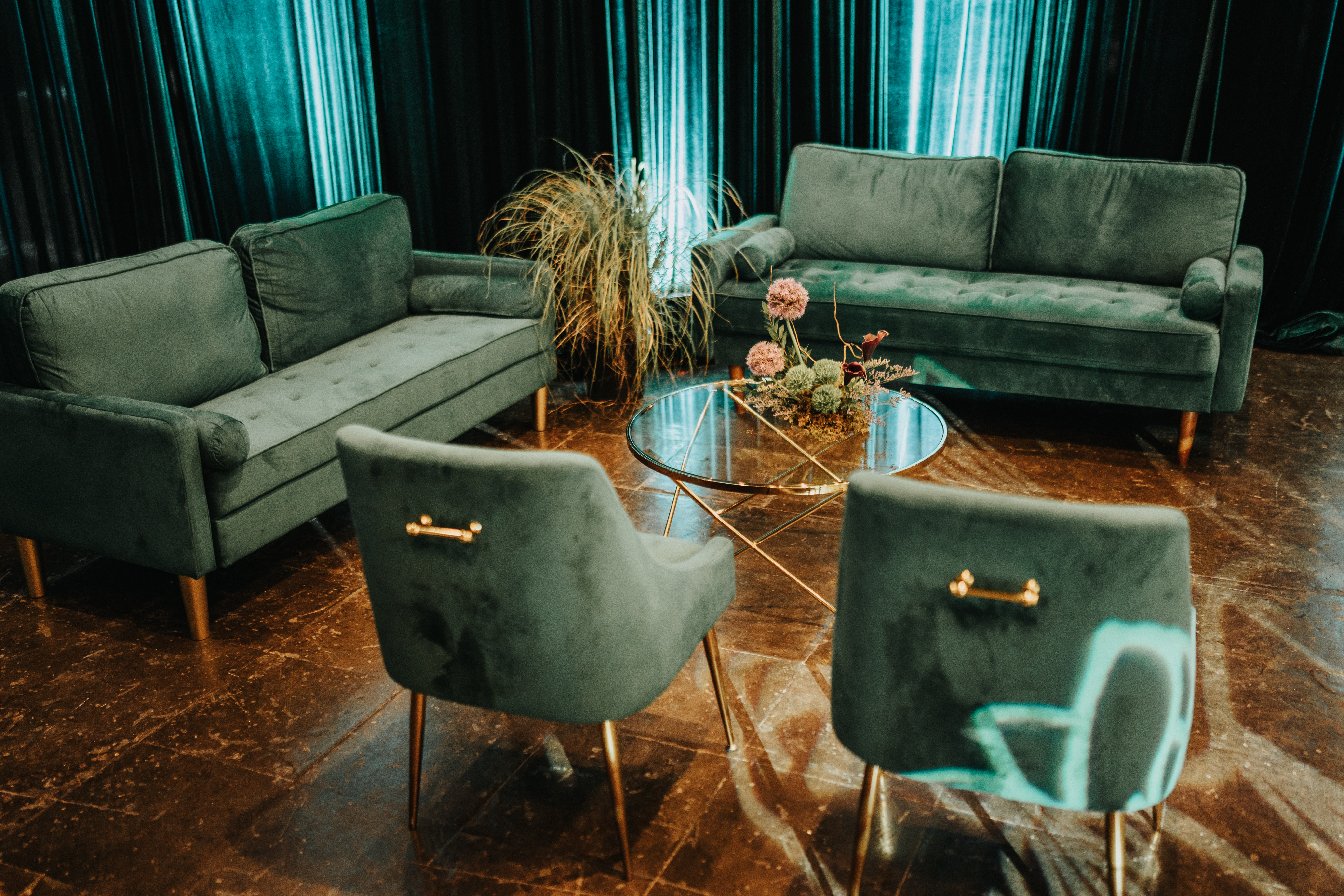 Green velvet lounge environment from the ELEVENTS rental collection