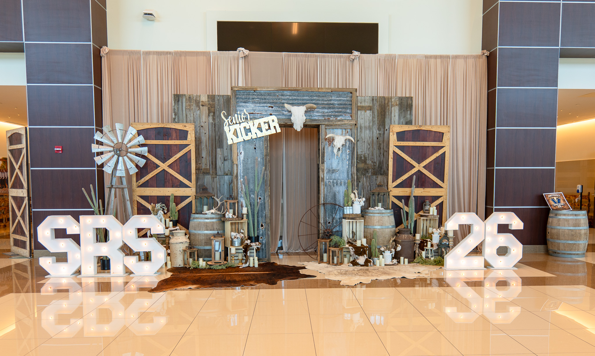 Patriot Kicker scenic installation and layered western details