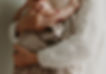Mum Holding Baby in a Blanket.jpg