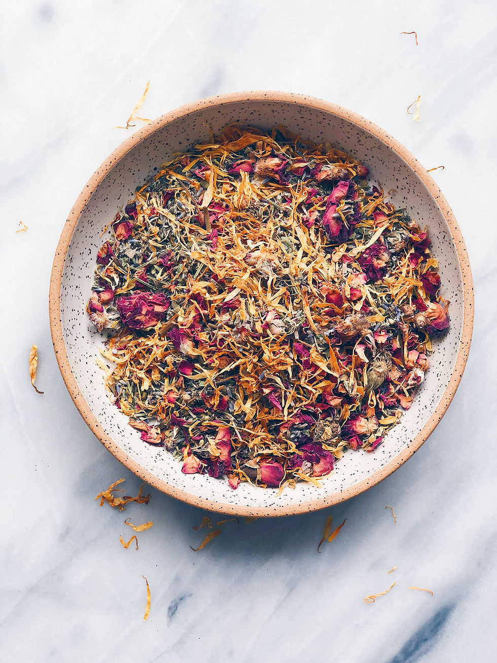 Thumbnail: White bowl of blended herbs on marble background aerial view