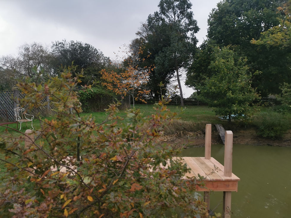 Jetty over water, larch timber, built in Staplecross, Sussex
