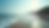 Wide angle view of a serene coastal landscape with gentle waves
