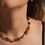 Thumbnail: the scarlett necklace