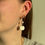 Thumbnail: pink pearl and shell earrings