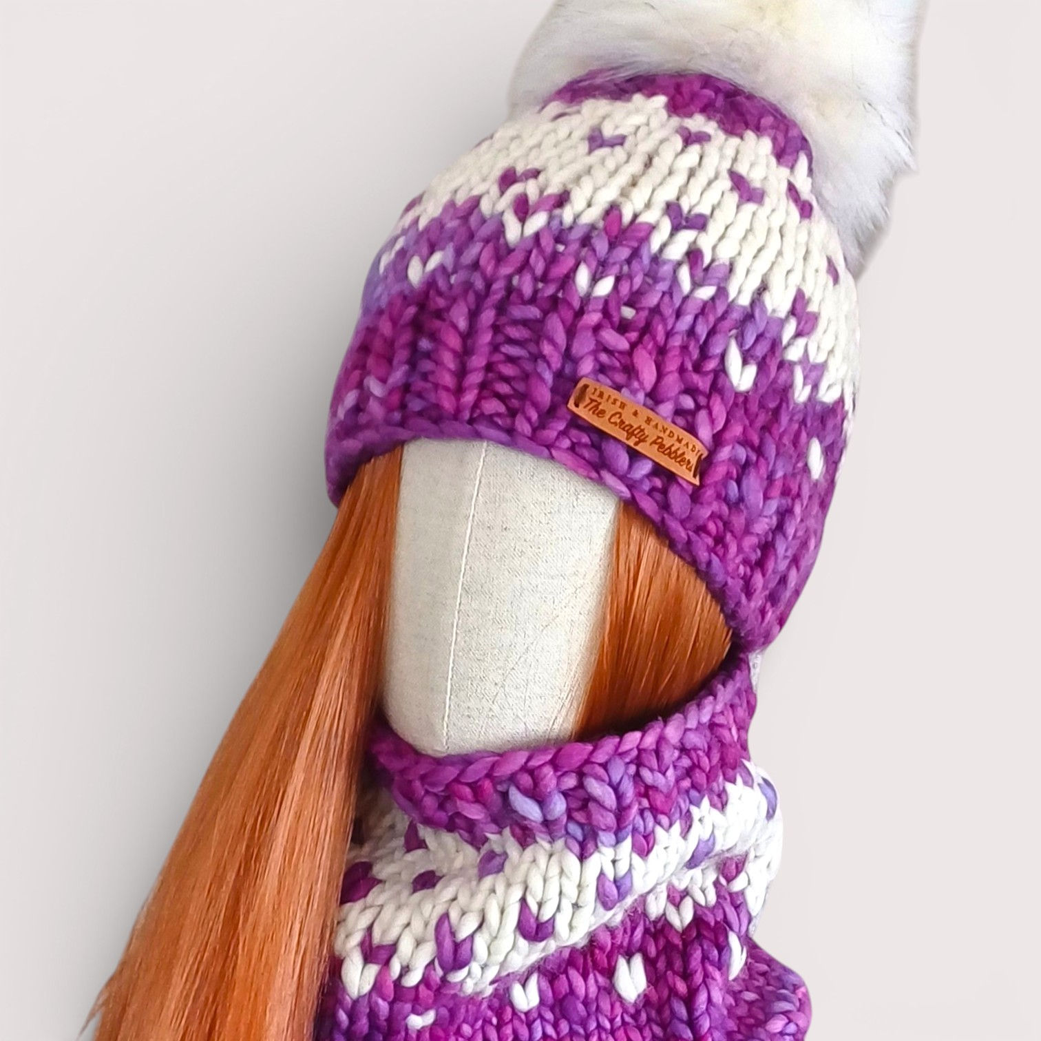 Front Main view of purple merino wool hat with pompom and matching cowl