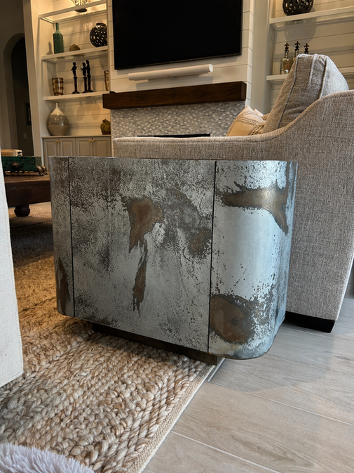 Custom metal and wood side table cabinet with rustic patina finish by RMS Custom Cabinetry in Lakewood Ranch, Florida