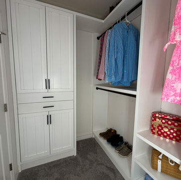 Modern custom closet system with adjustable shelving and shoe storage