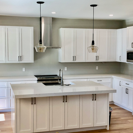 Luxury custom wood kitchen cabinetry with hidden storage and soft-close drawers