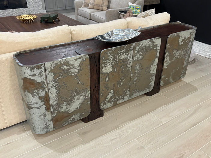 Custom living room media gallery with reclaimed wood and hand-aged metal accents in Sarasota home