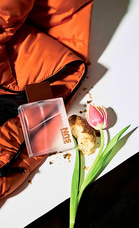 Jil Sander collection featuring geometric pedestal styling and soft natural lighting, highlighting minimalist tailoring and premium fabric textures.