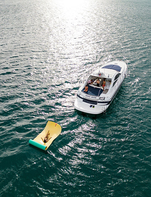 Friends enjoying a private yacht rental tour in Cabo San Lucas