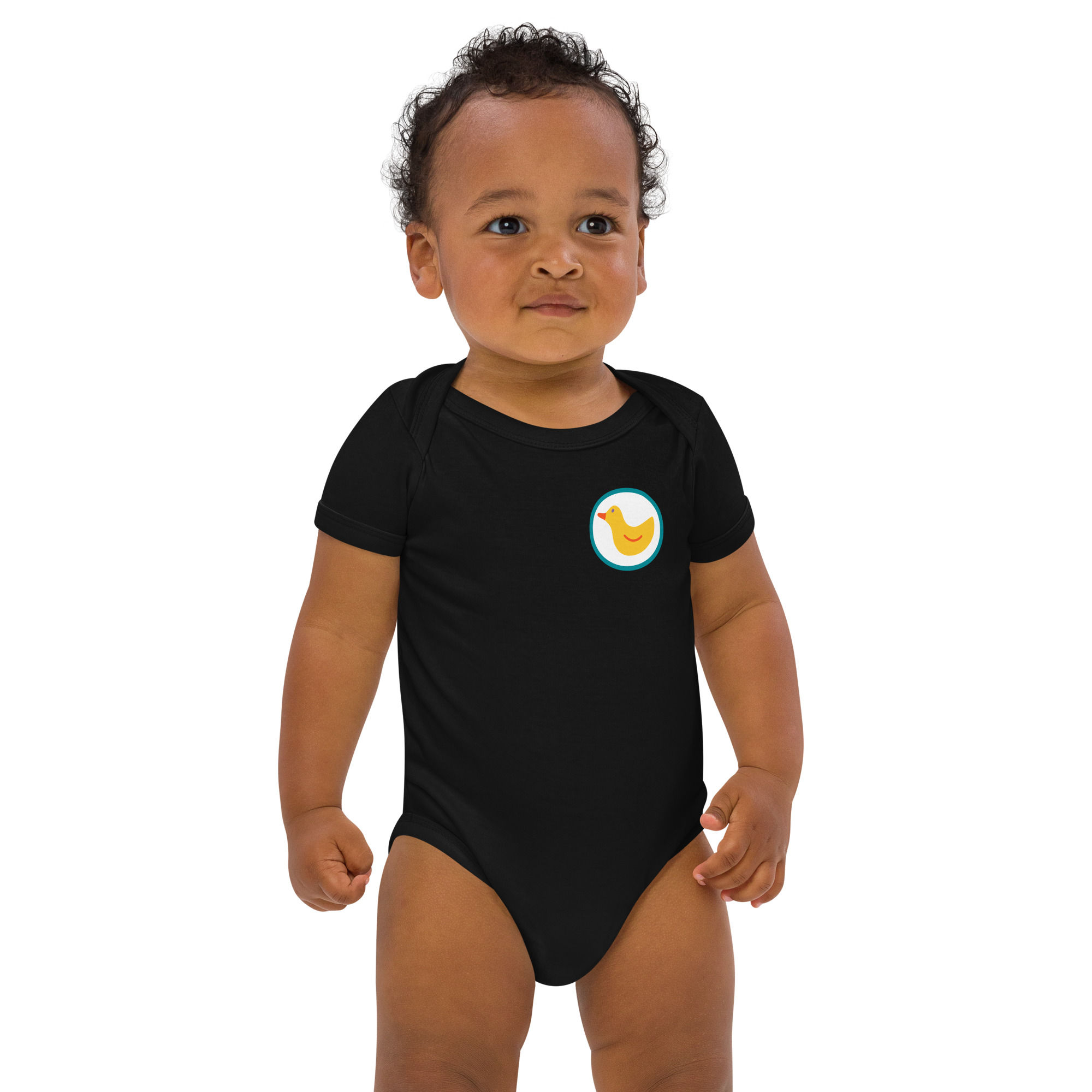 Baby wearing a black bodysuit with a yellow duck logo.