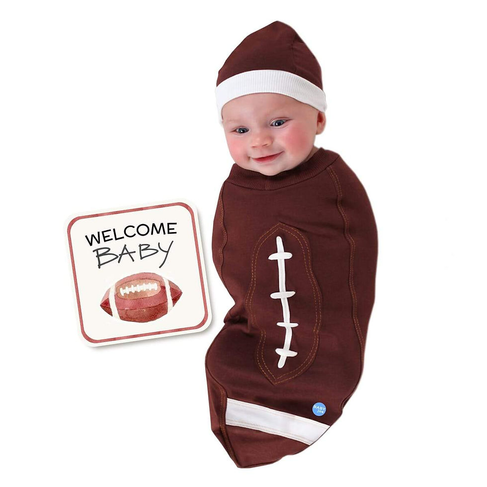 Baby swaddled in a football-themed towel with matching hat