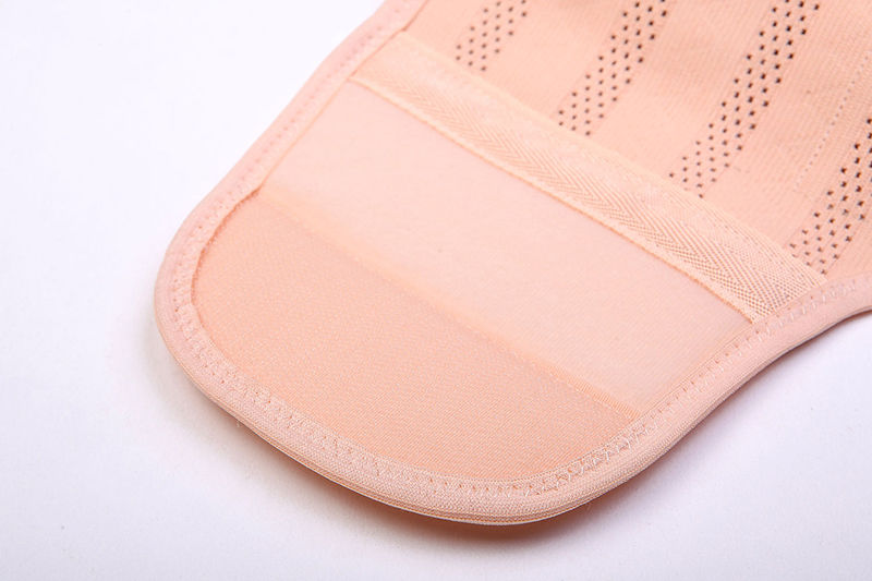 Thumbnail: Close-up of a pink maternity support belt's fabric texture.