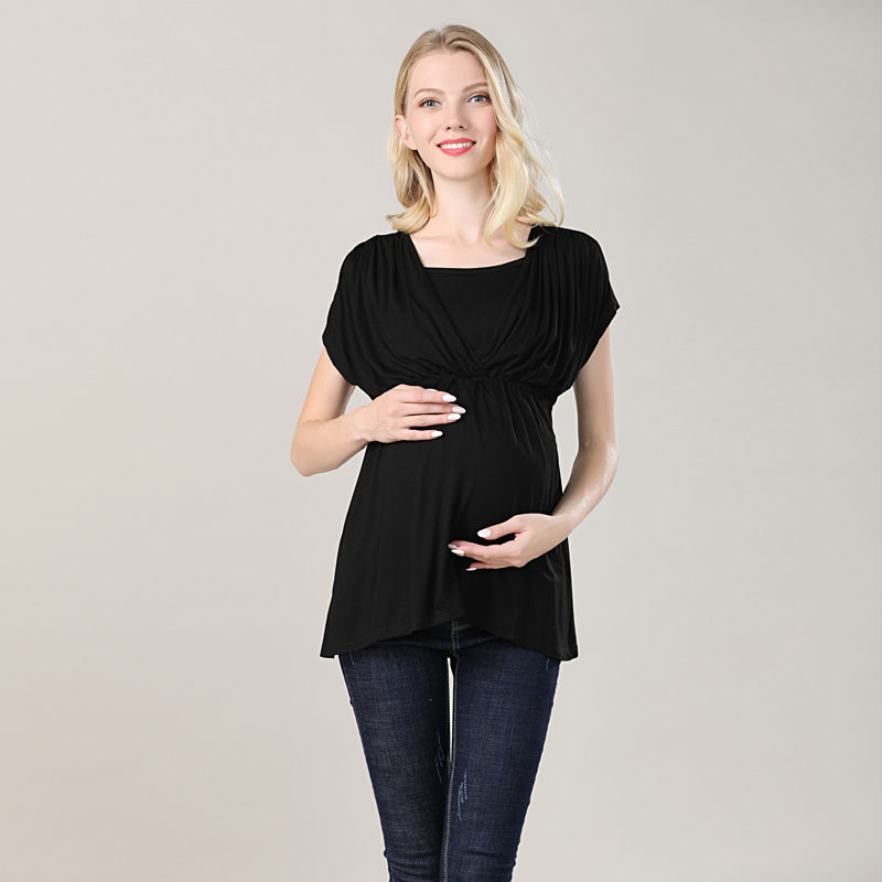 Thumbnail: Pregnant woman wearing a black short-sleeved maternity shirt