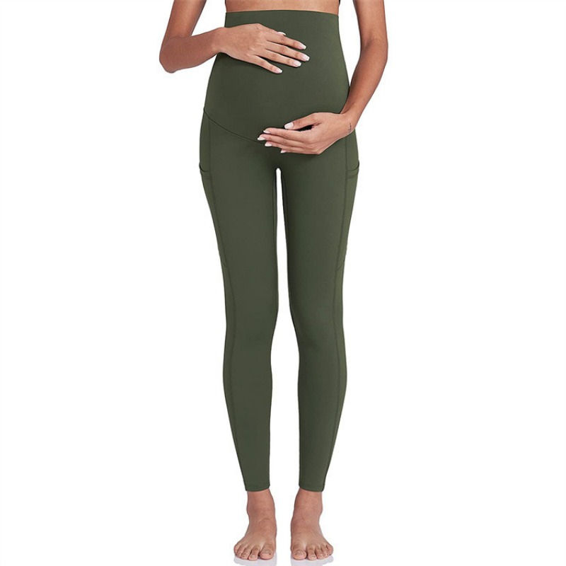 Thumbnail: Pregnant woman wearing olive green maternity leggings