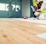 Installing wooden laminate flooring.jpg
