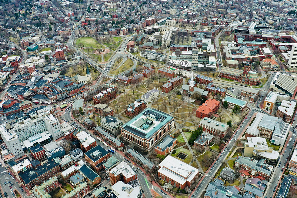 aerial view of havard square with buildings during daytime by Henry Dixon