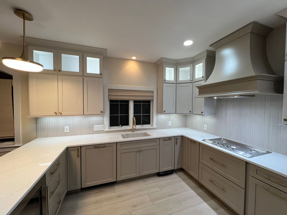 Beige Kitchen Cabinets with Peninsula Seating