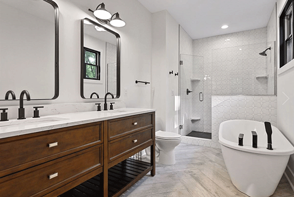 Bathroom remodel. New tiled shower and tiled floor. Bathtub. New vanity. Custom bathroom layout remodel, rebuild.
