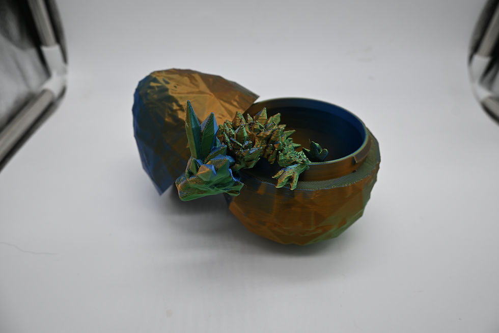 Thumbnail: 3D printed Egg with small dragon