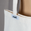 Miniaturbild: Detail vom stoff.werk Label am oberen Rand der Baumwollbeutels.