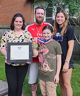 Pelletier Family - Receiving Award_edited.jpg
