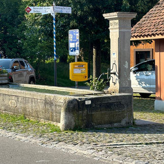 A drinking water fountain in a village in Opfikon
