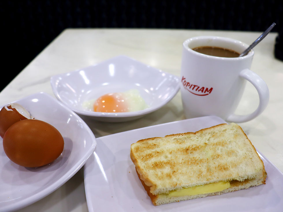 Kaya Sandwich with half-boiled eggs and coffee