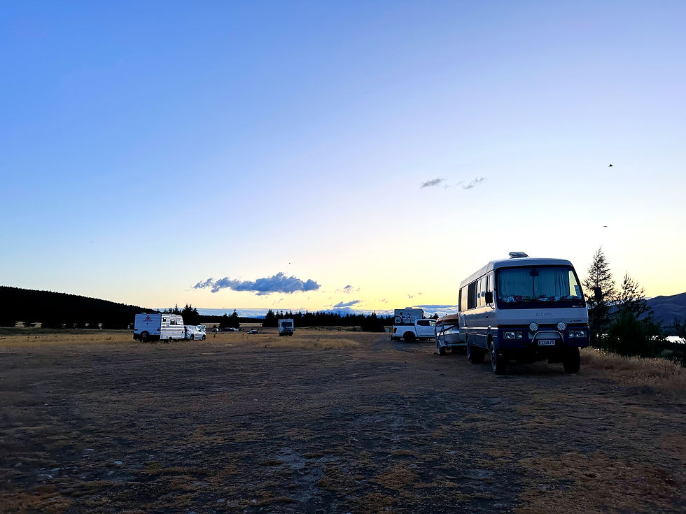 Vans and Campervans parked in a Freedom Parking lot.