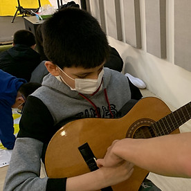 boy playing guitar