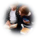A Man and Woman Reading A Book