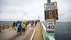 Viral video of a runner challenging a rogue wave