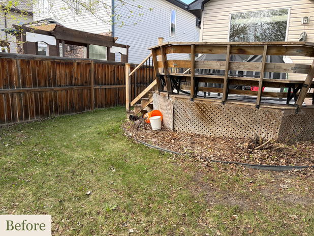 Backyard with old wooden deck