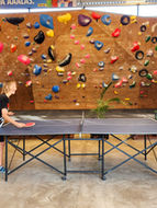 kids playing ping pong at tacana climbing gym in antigua guatemala