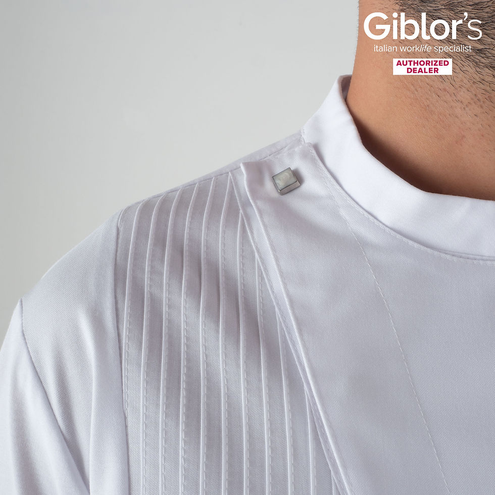 Giblor's Cesare Long Sleeve Men's Chef Jacket White on Man Shoulder Close Up with Authorised Dealer Logo